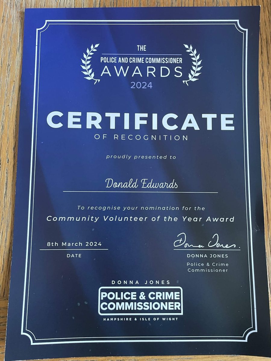 Donald 'Bugsy' Edwards receiving the 2024 Hampshire & Isle of Wight Police & Crime Commissioner Community Volunteer of the Year award