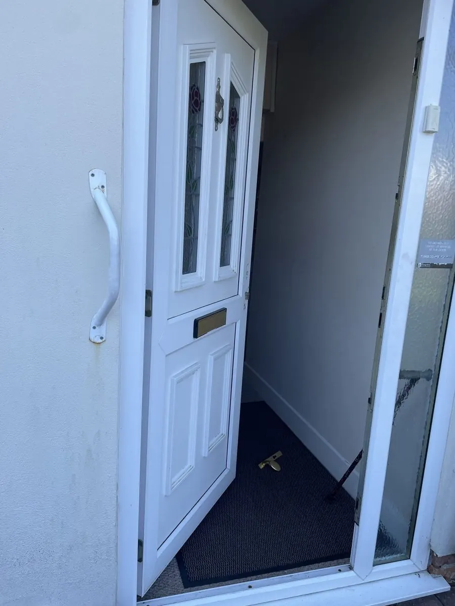 Bugsy fitting a Police Preferred key safe and accessibility lock for an elderly Waterside resident