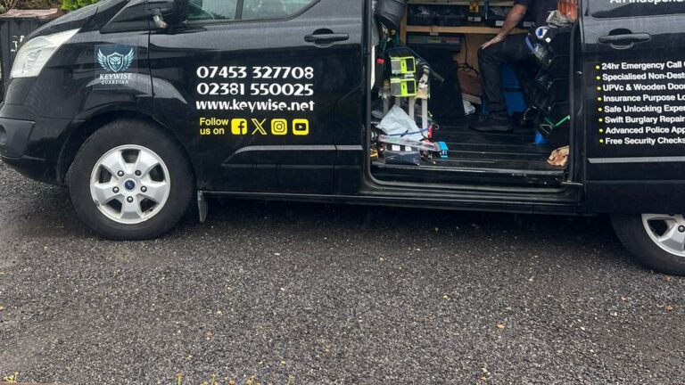 The Keywise van on a Waterside driveway, side door open, tools and bench inside, phone numbers and keywise.net on the side