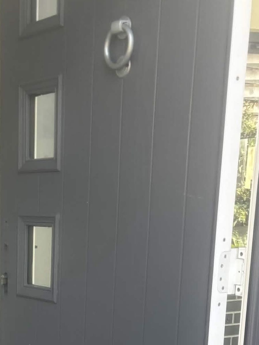 Grey composite front door in Chandler's Ford, standing open